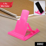 Portable foldable plastic mobile phone stand showing adjustable tilt angles