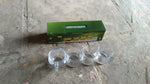 Close-up of the ridged design detail on a clear glass mug from the drinkware set.