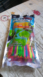 A stack of 111 multi-color Holi water balloons packaging.