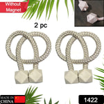 Close-up of decorative pearl curtain tieback, highlighting its intricate design and texture.