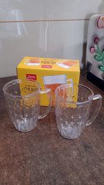 Brightly lit display of two acrylic Mocktail Mugs perfect for juices and lassi