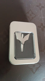 Nose hair remover stored safely in its protective metal case