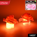 Close-up of rose-shaped LED tealight candles emitting flickering light