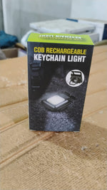 Side view of the rechargeable keychain flashlight with its magnetic base.