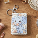 Foldable compact mirror keychain showing durable build and metal keyring
