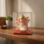 Alternate angle of hand-moving small Ganesha idol with vibrant finish