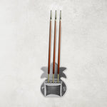 Set of three durable metal incense stick holders ideal for pooja room rituals.