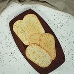 Close-up of a Khakhra piece, highlighting its thin and crispy texture.