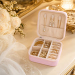 A compact PU leather jewellery organiser filled with rings and earrings, demonstrating its storage capacity.