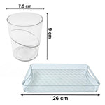 Close-up of transparent glass tumblers with tray