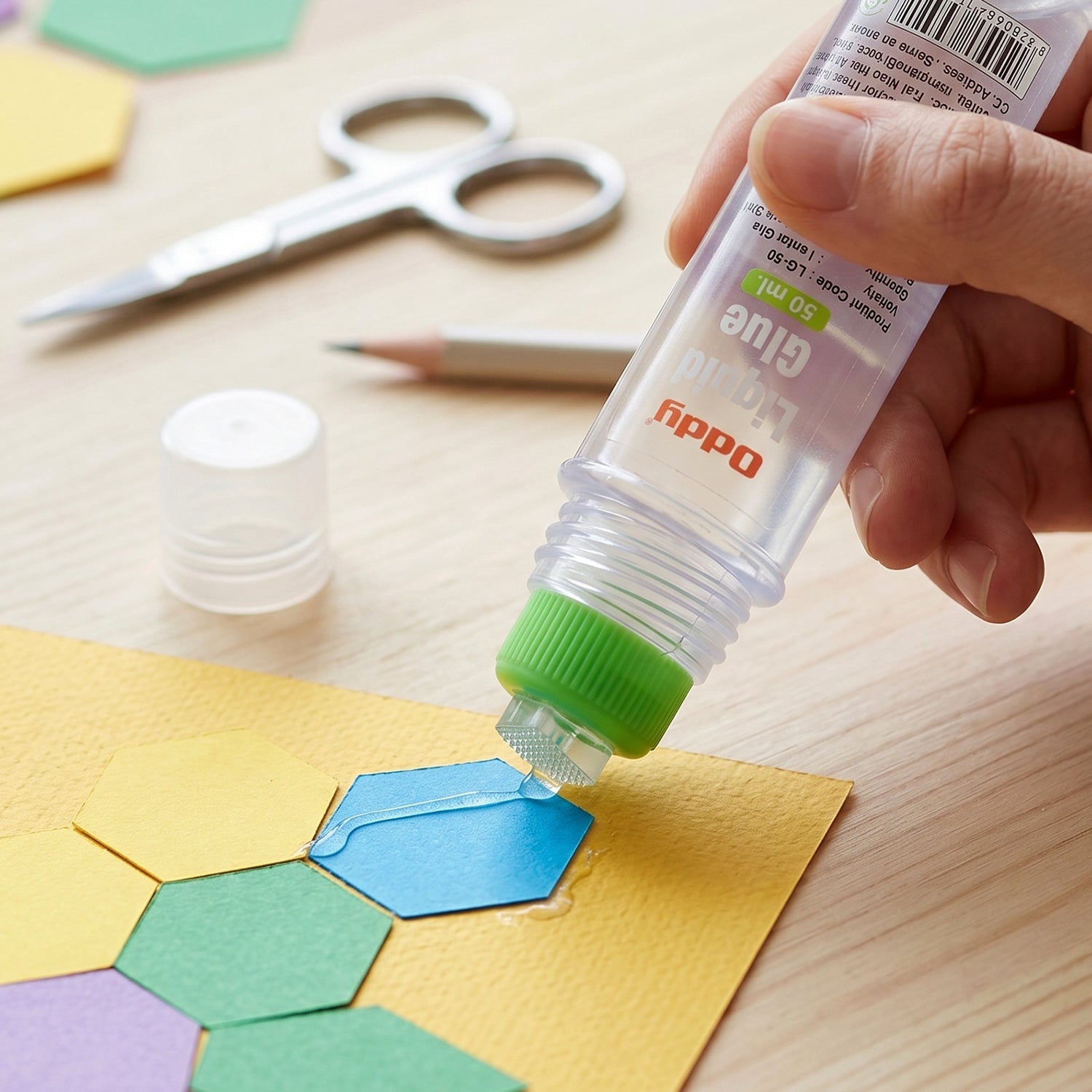 Mess-free liquid adhesive pen for crafts, school, and office use