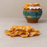 Detailed view of elastic closure on printed matka cover