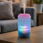 Close-up of the quiet mini humidifier releasing soothing cool mist.