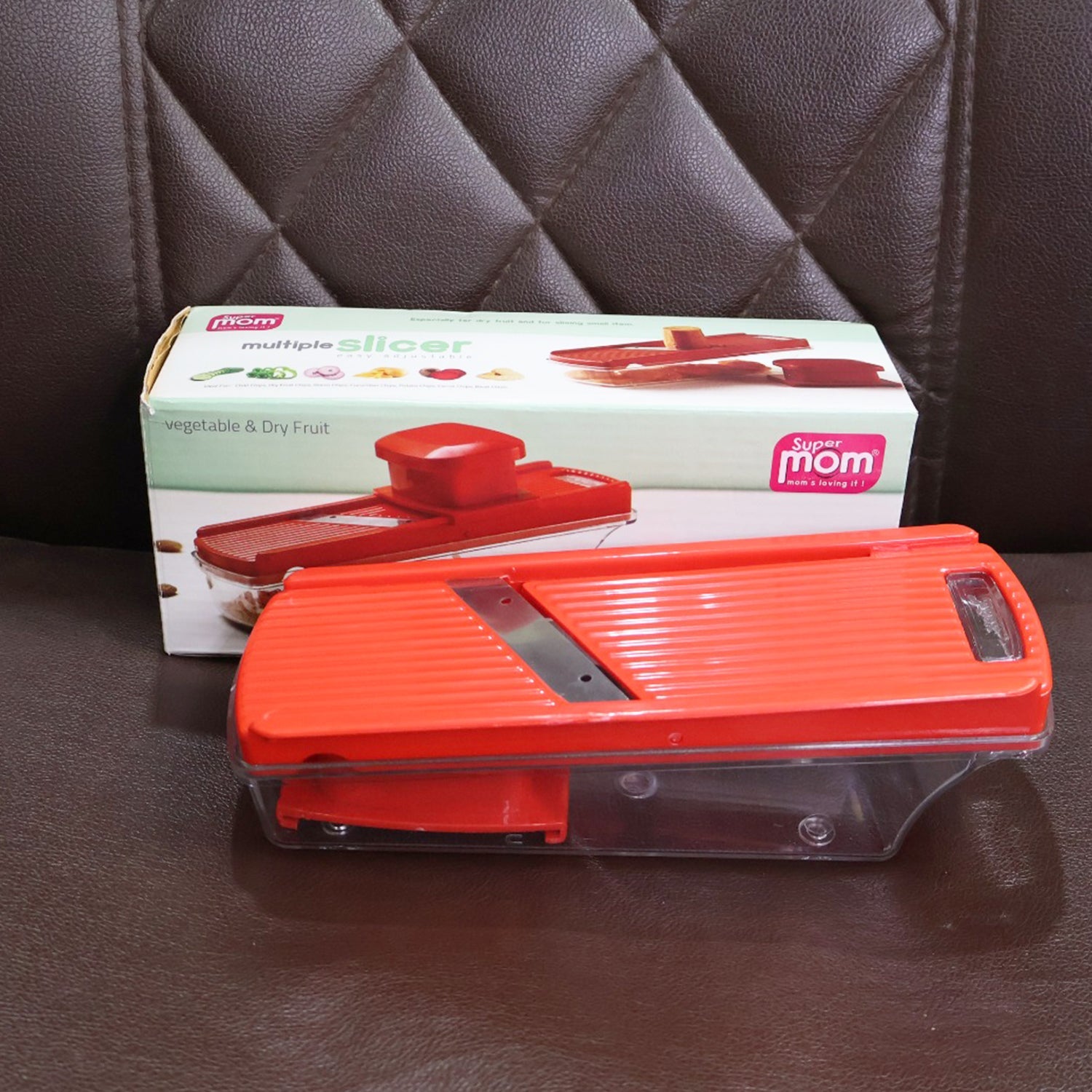 Food-grade container attached to vegetable and dry fruit slicer