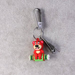 Front view of the Cartoon Nail Cutter Keychain with mixed cartoon designs