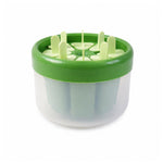Plastic ice candy popsicle maker on white surface for easy storage
