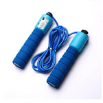 Person exercising with a digital counting skipping rope.