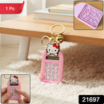 Closeup of portable mini digital calculator keychain with cartoon cat design