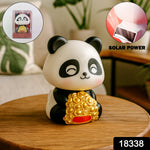 Close-up of the solar panel on the base of the dancing panda showpiece.