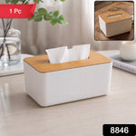 Close-up of the natural wood grain on the bamboo tissue box holder.