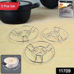 Close-up view of stainless steel wire trivets showing heat-resistant design