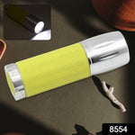 Overhead view of the Poravar Mini LED Flashlight, highlighting its sleek design.