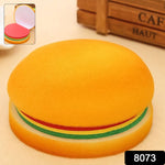Stack of multicolor burger sticky notes next to a pen, ready for jotting down important memos.
