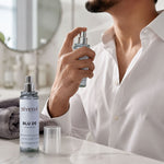 Fragrance mist spray detail showcasing fine mist application