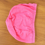 Stylish pink swim head cap, waterproof and snug-fitting