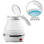 Collapsible travel electric kettle in a vibrant blue and white color.
