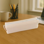 Compact stationery pouch made of PU leather, ideal for brushes or office supplies.